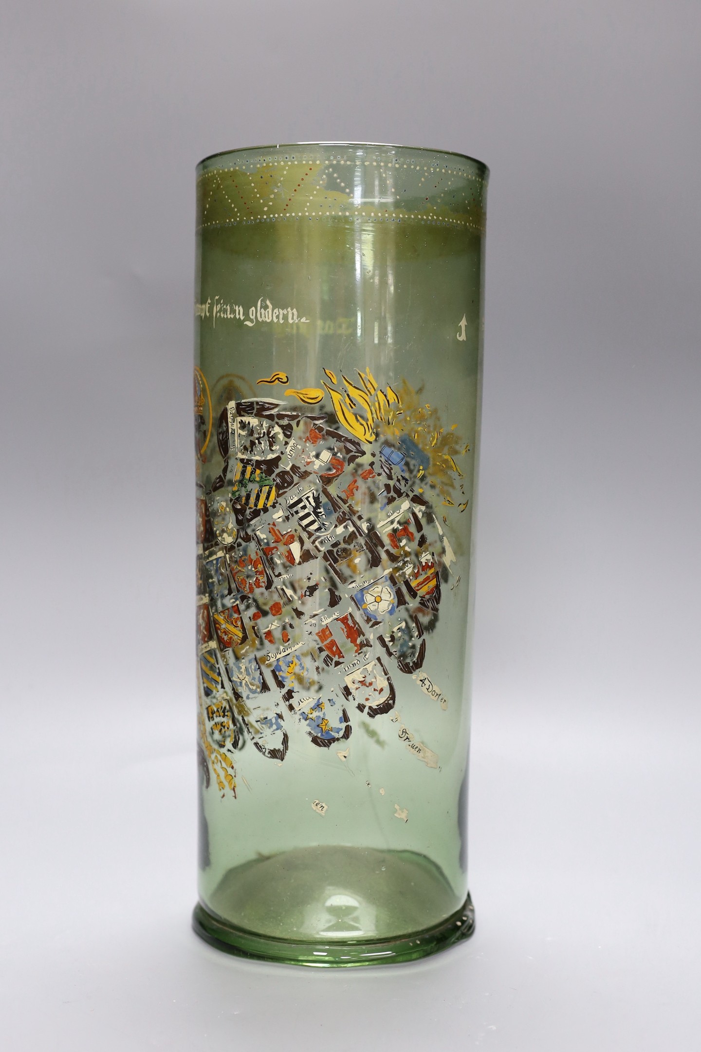 A German glass Humpen with collector's labels on base, painting a little worn, circa 18th century, 39 cms high